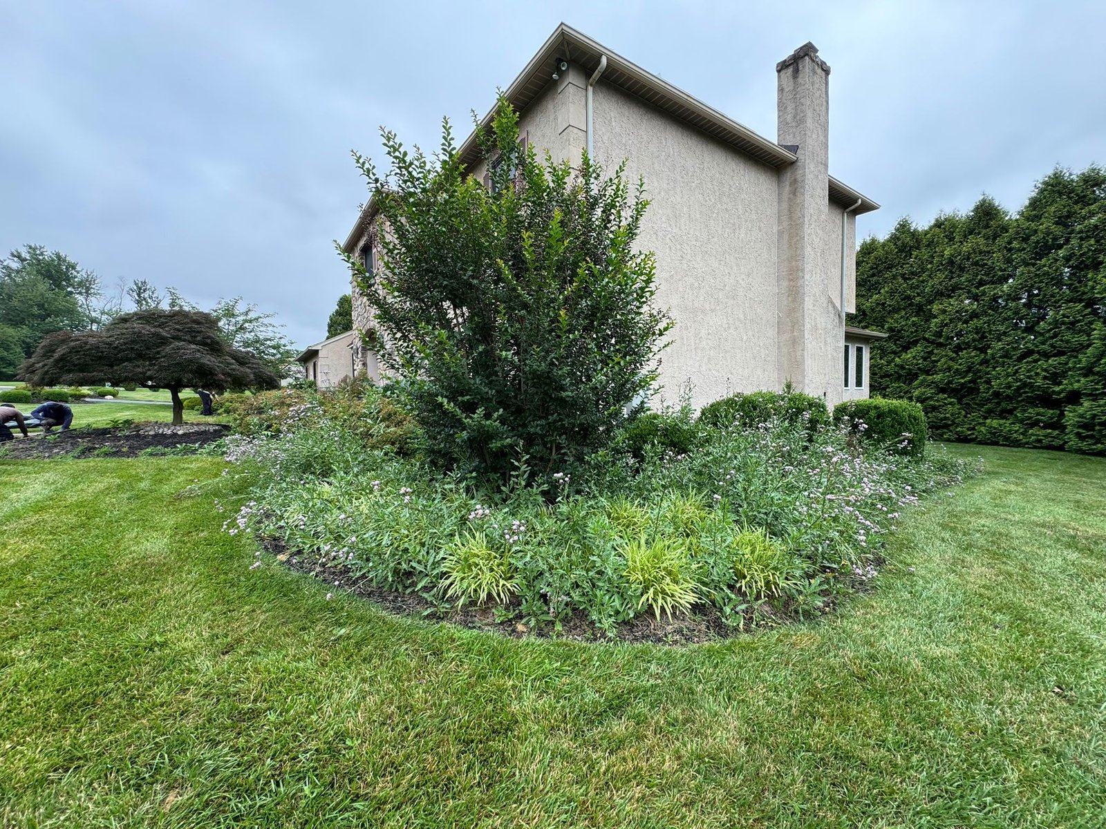 Mulch installation work by Green Force Property Services